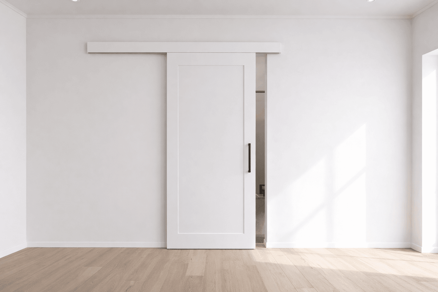 Modern interior with a white sliding door in a minimalistic room.